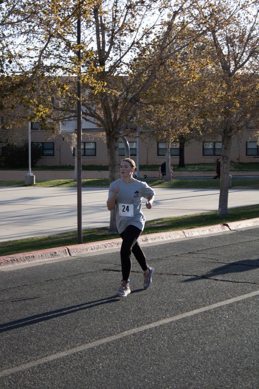 Chloe completing the run at the Lobo Tri